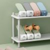 Double-layer three-dimensional adjustable shoe rack